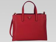 Prada Soft Saffiano Triangle Logo Bag In Red P471392